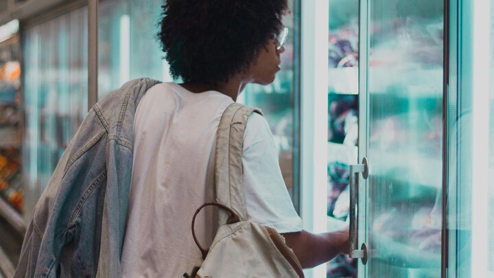 Student in the grocery store aisle