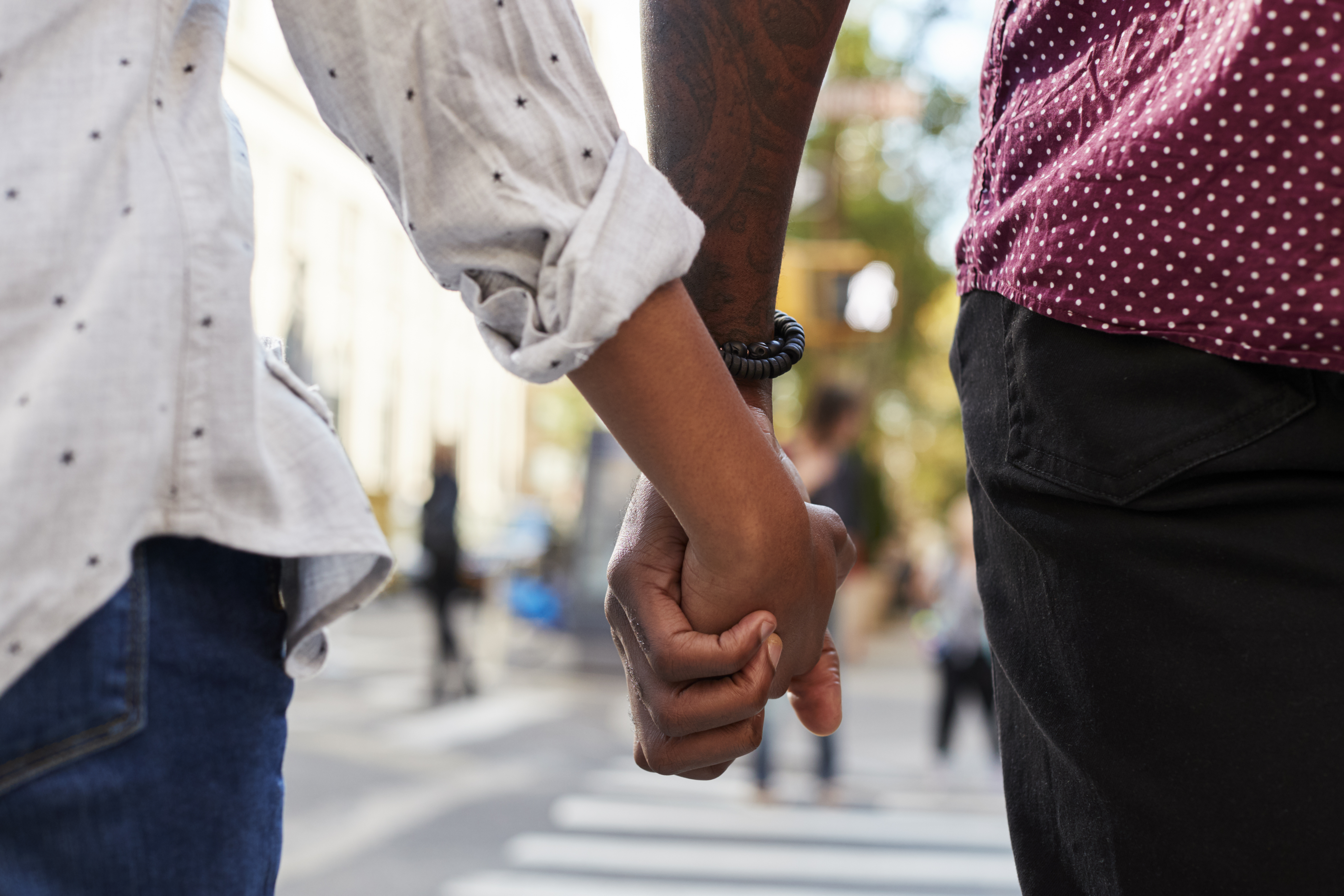 Couple holding hands